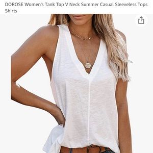 V neck white sleeveless top.